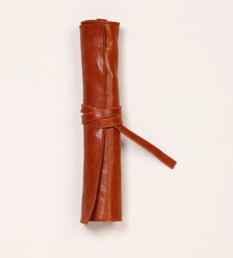 Trousse ronde marron en cuir véritable