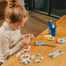 Lot de 100 pompons à trou - 5 couleurs pastels assorties