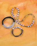 Perles disques plastique percés 50g Alphabet coloré 5x2mm